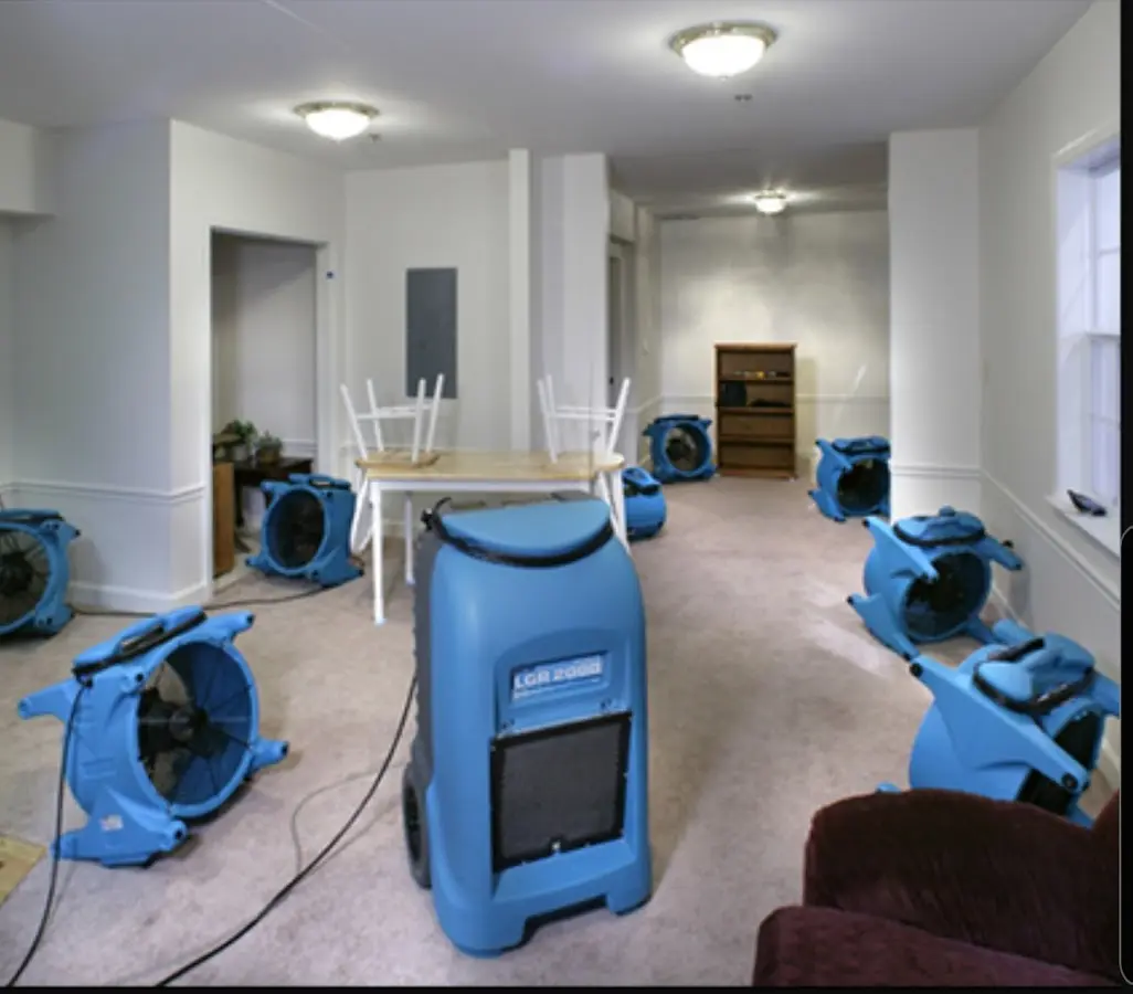 Air movers and dehumidifier setup for Water Damage Restoration in Ironton